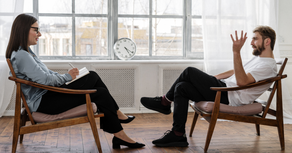 An image of a person in therapy, highlighting mental health myths.